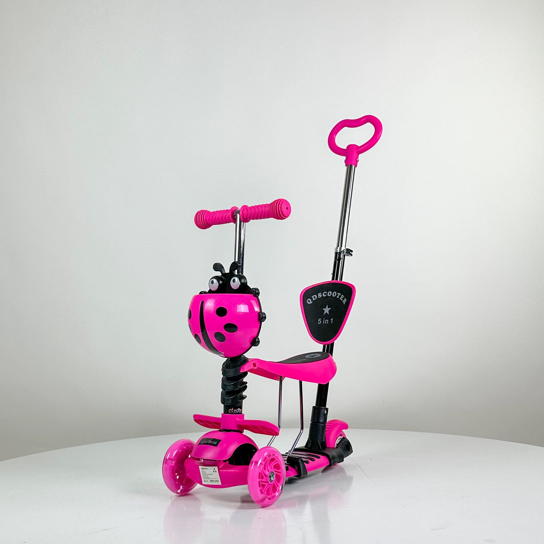 652  Dečiji trotinet 5 u 1 Bubamare sa sedistem, LED tockovima i korpom roze